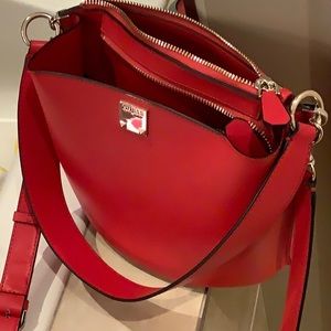 Guess red purse with two strap options.